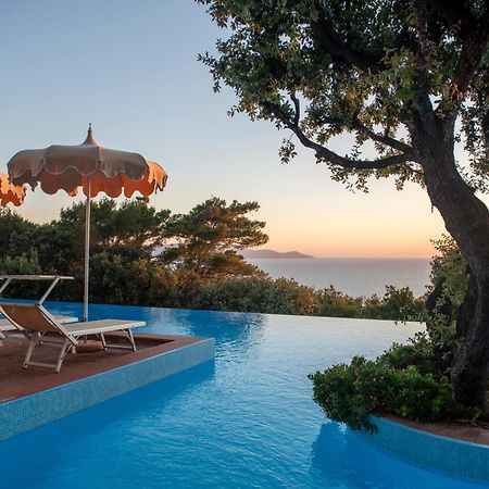 Boutique Hotel Torre Di Cala Piccola Порто Санто Стефано Екстериор снимка