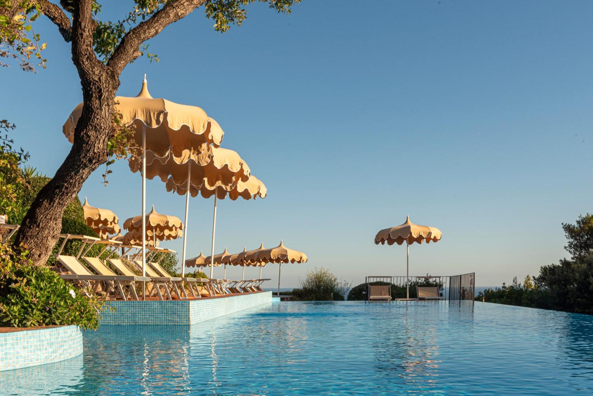 Boutique Hotel Torre Di Cala Piccola Порто Санто Стефано Екстериор снимка