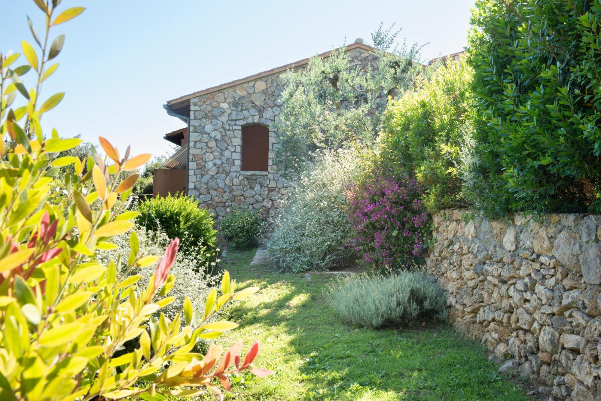 Boutique Hotel Torre Di Cala Piccola Порто Санто Стефано Екстериор снимка