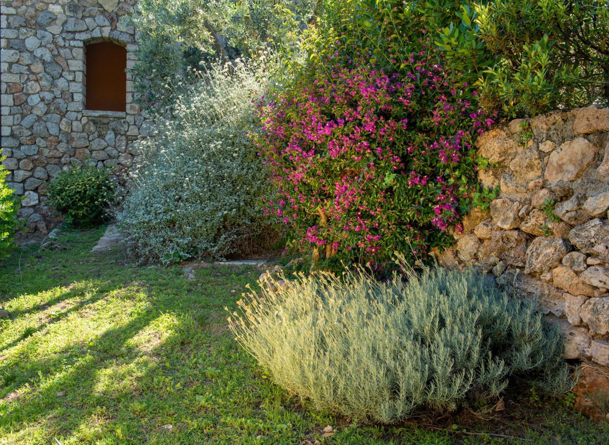 Boutique Hotel Torre Di Cala Piccola Порто Санто Стефано Екстериор снимка