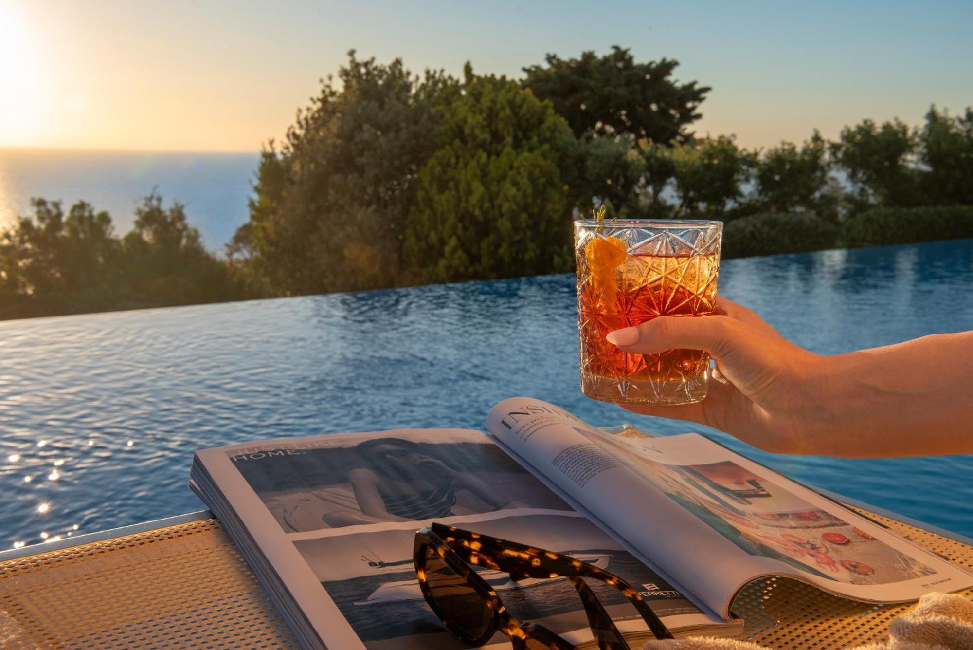 Boutique Hotel Torre Di Cala Piccola Порто Санто Стефано Екстериор снимка