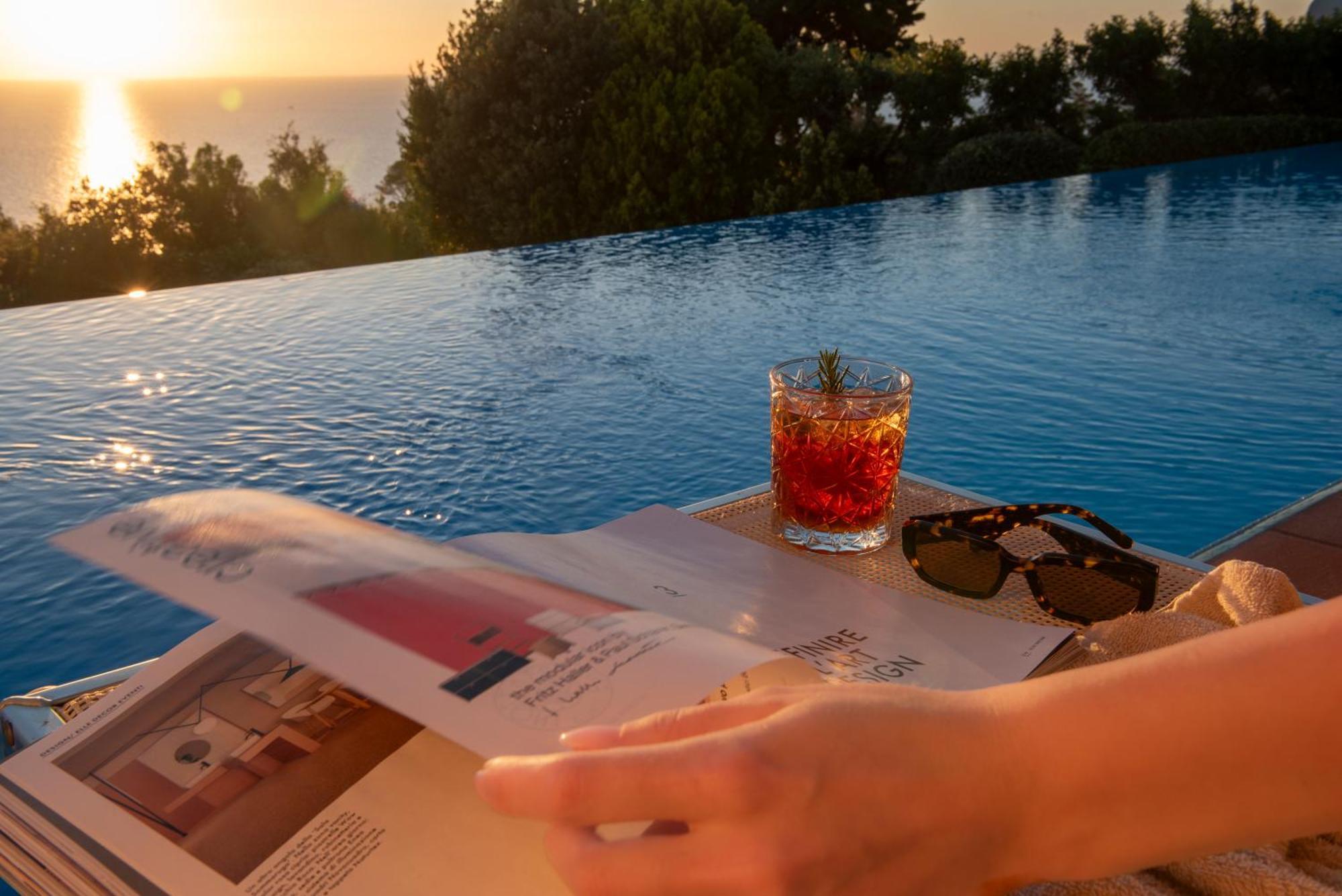 Boutique Hotel Torre Di Cala Piccola Порто Санто Стефано Екстериор снимка