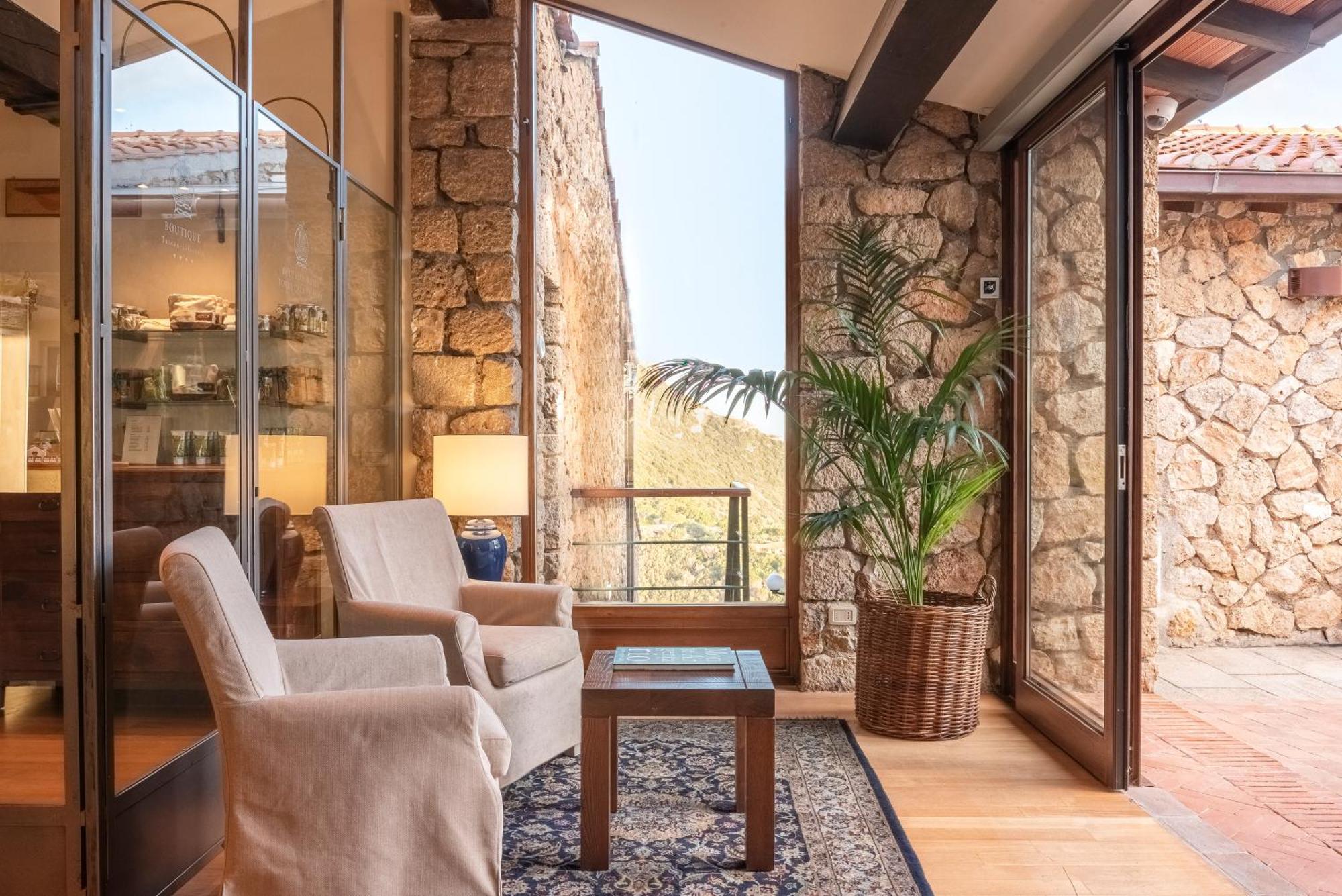 Boutique Hotel Torre Di Cala Piccola Порто Санто Стефано Екстериор снимка