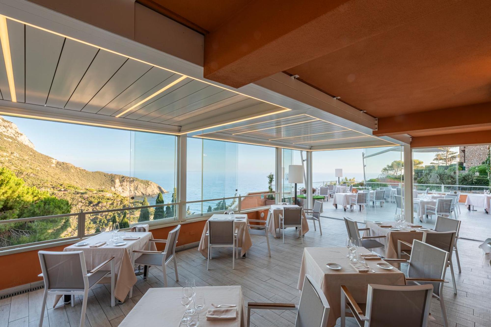 Boutique Hotel Torre Di Cala Piccola Порто Санто Стефано Екстериор снимка