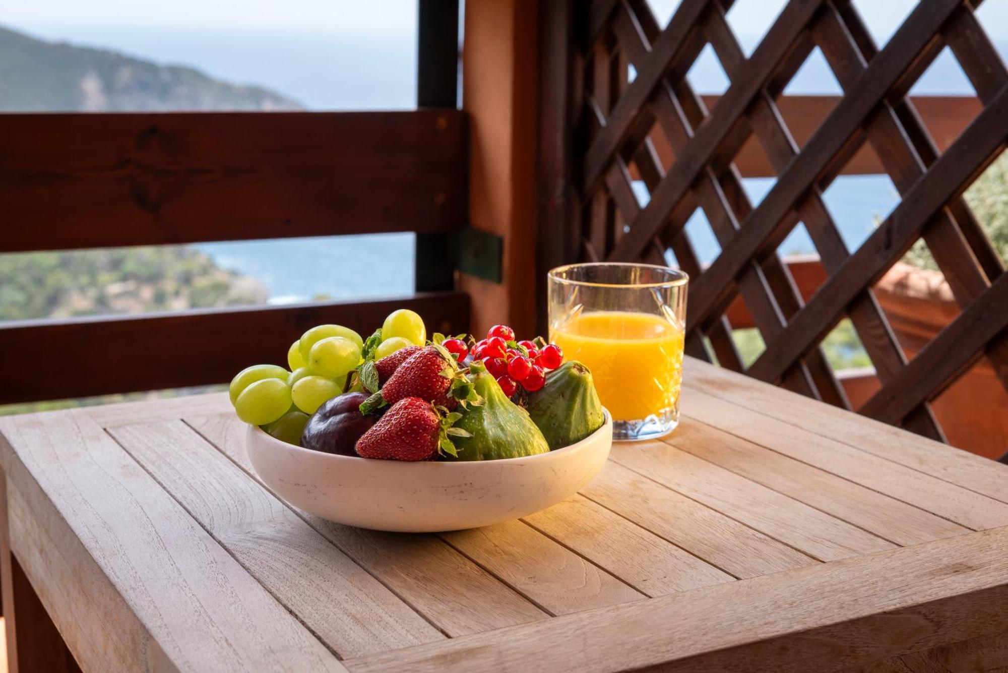 Boutique Hotel Torre Di Cala Piccola Порто Санто Стефано Екстериор снимка