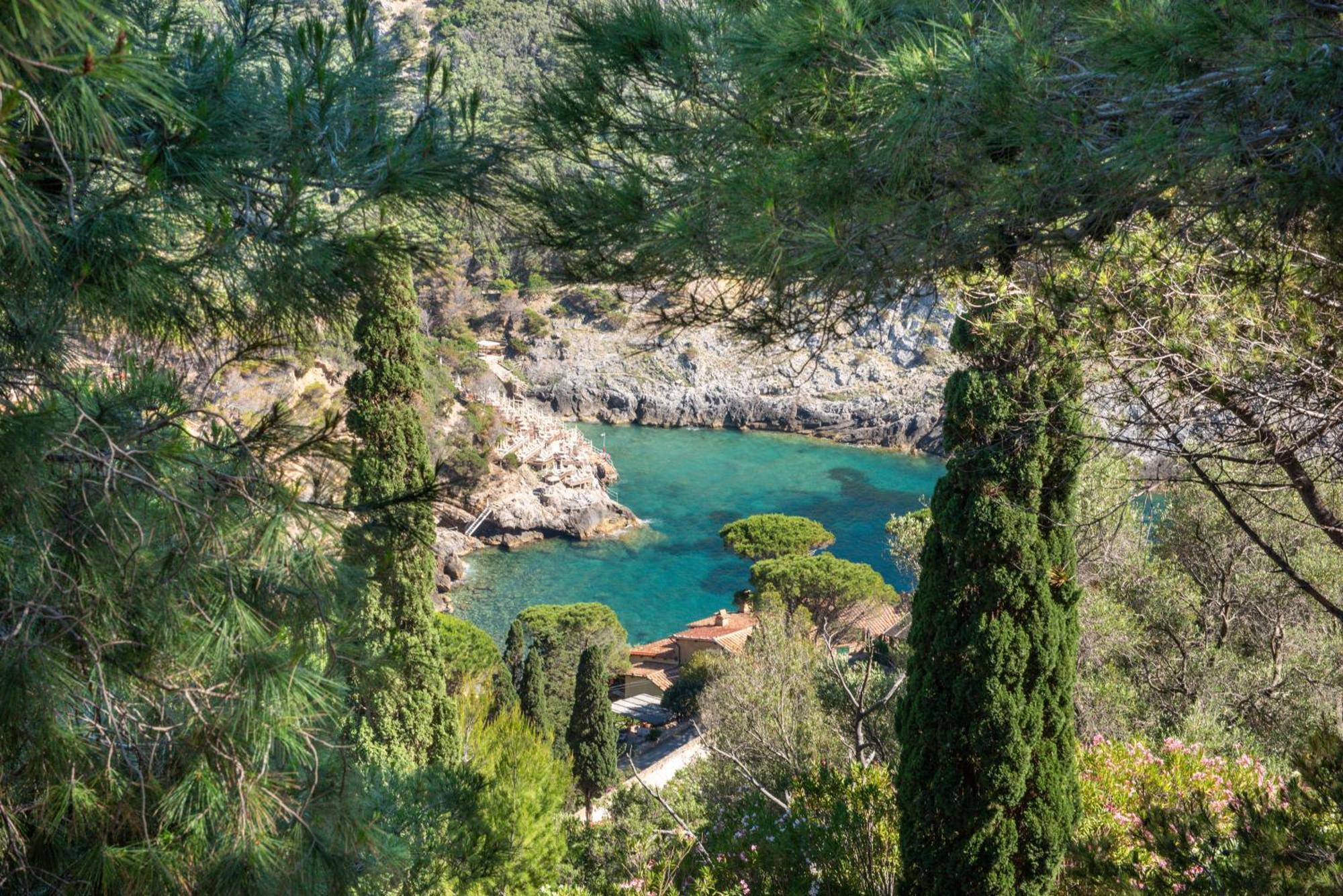 Boutique Hotel Torre Di Cala Piccola Порто Санто Стефано Екстериор снимка