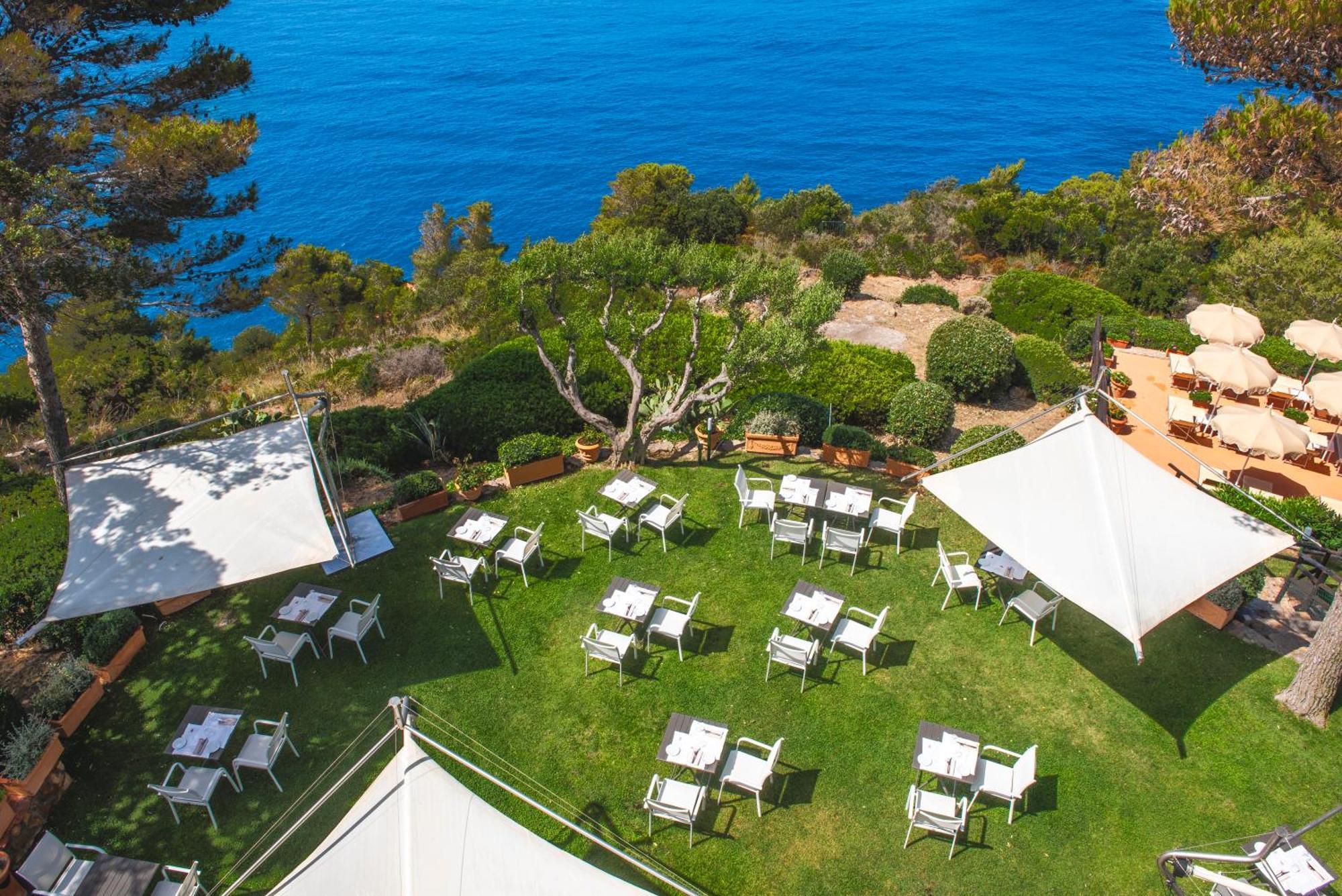 Boutique Hotel Torre Di Cala Piccola Порто Санто Стефано Екстериор снимка