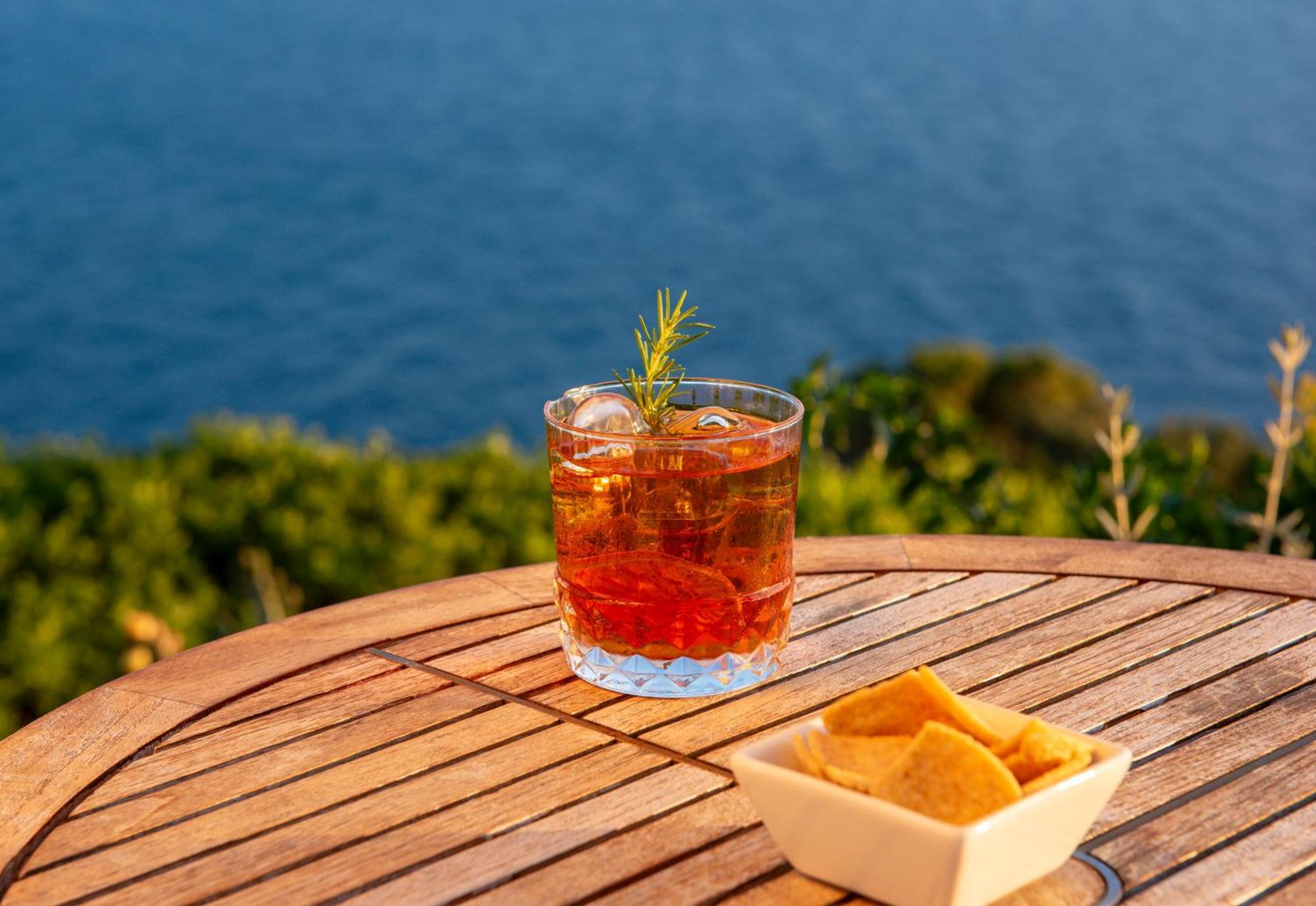 Boutique Hotel Torre Di Cala Piccola Порто Санто Стефано Екстериор снимка